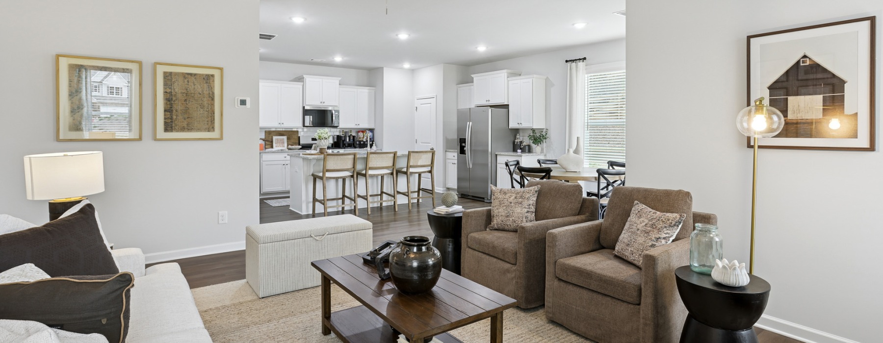 living room with seating and lamps